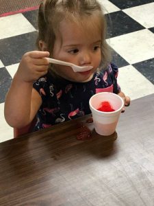 toddler eating water ice